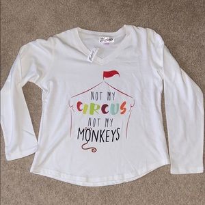 Victoria’s White v neck sweatshirt “not my circus”